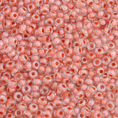#6/0 ROCAILLES - APPROX 40G - INSIDE COLOUR LINED CORAL