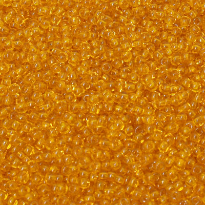 #11/0 ROCAILLES - APPROX 40G - TRANSPARENT LIGHT ORANGE