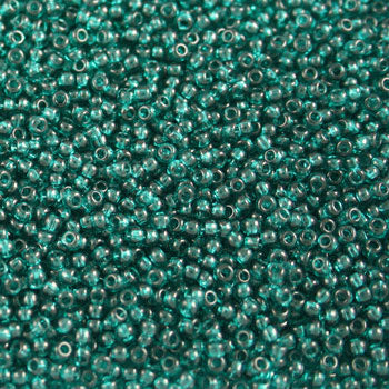 #11/0 ROCAILLES - APPROX 40G - TRANSPARENT TEAL GREEN