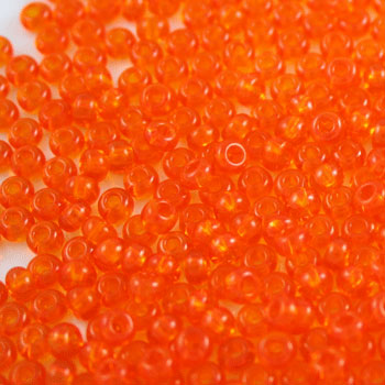 #6/0 ROCAILLES - APPROX 40G - TRANSPARENT ORANGE