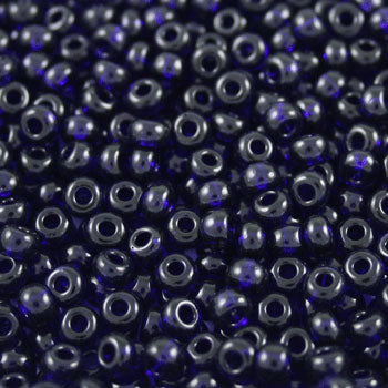 #6/0 ROCAILLES - APPROX 40G - TRANSPARENT ROYAL BLUE