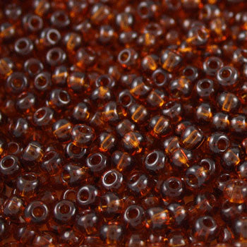 #6/0 ROCAILLES - APPROX 40G - TRANSPARENT TOPAZ