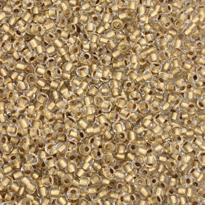 #8/0 ROCAILLES  - APPROX 40G - INSIDE COLOUR LINED BRONZE