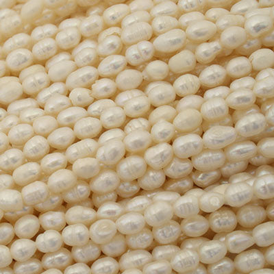 6.5 X 4.5 MM FRESH WATER PEARLS - 35 CM STRAND (FWP20)