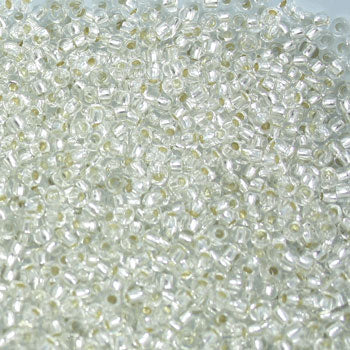 #11/0 ROCAILLES  - APPROX 35G -  CRYSTAL SILVER LINED
