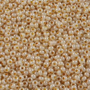 #9/0 ROCAILLES  - APPROX 40G - LIGHT ORANGE ALABASTER